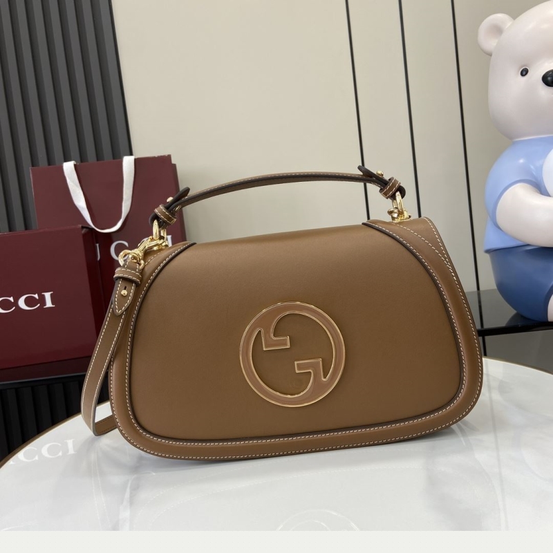 G*u*i top handle bags